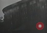 Image of American soldiers fire rifles at snipers in a building Leipzig Germany, 1945, second 46 stock footage video 65675023570