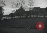 Image of American soldiers fire rifles at snipers in a building Leipzig Germany, 1945, second 50 stock footage video 65675023570