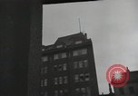 Image of American soldiers fire rifles at snipers in a building Leipzig Germany, 1945, second 53 stock footage video 65675023570