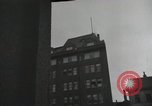 Image of American soldiers fire rifles at snipers in a building Leipzig Germany, 1945, second 54 stock footage video 65675023570