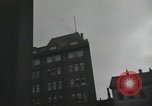 Image of American soldiers fire rifles at snipers in a building Leipzig Germany, 1945, second 56 stock footage video 65675023570