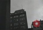 Image of American soldiers fire rifles at snipers in a building Leipzig Germany, 1945, second 57 stock footage video 65675023570