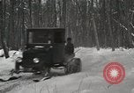 Image of Ford automobile with skis Michigan United States USA, 1918, second 17 stock footage video 65675023594