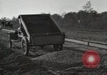 Image of road under construction United States USA, 1918, second 17 stock footage video 65675023595