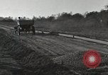 Image of road under construction United States USA, 1918, second 26 stock footage video 65675023595
