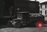 Image of laborers transfer produce United States USA, 1918, second 23 stock footage video 65675023596