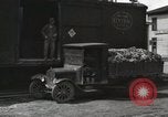 Image of laborers transfer produce United States USA, 1918, second 24 stock footage video 65675023596