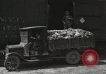 Image of laborers transfer produce United States USA, 1918, second 33 stock footage video 65675023596