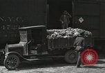 Image of laborers transfer produce United States USA, 1918, second 38 stock footage video 65675023596