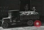 Image of laborers transfer produce United States USA, 1918, second 43 stock footage video 65675023596