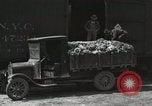 Image of laborers transfer produce United States USA, 1918, second 44 stock footage video 65675023596