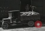 Image of laborers transfer produce United States USA, 1918, second 45 stock footage video 65675023596