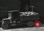 Image of laborers transfer produce United States USA, 1918, second 46 stock footage video 65675023596