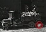 Image of laborers transfer produce United States USA, 1918, second 48 stock footage video 65675023596