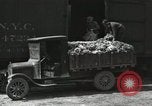 Image of laborers transfer produce United States USA, 1918, second 52 stock footage video 65675023596