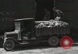 Image of laborers transfer produce United States USA, 1918, second 53 stock footage video 65675023596