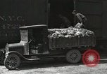 Image of laborers transfer produce United States USA, 1918, second 54 stock footage video 65675023596