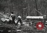 Image of workers load timber United States USA, 1926, second 16 stock footage video 65675023598