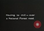 Image of workers load timber United States USA, 1926, second 35 stock footage video 65675023598