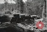 Image of workers load timber United States USA, 1926, second 42 stock footage video 65675023598