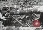 Image of workers load timber United States USA, 1926, second 24 stock footage video 65675023599