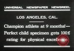 Image of man performs stunts on 9 months baby Los Angeles California USA, 1931, second 9 stock footage video 65675023610