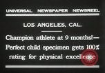 Image of man performs stunts on 9 months baby Los Angeles California USA, 1931, second 11 stock footage video 65675023610