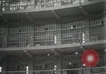 Immagine di Set penitenziario di incendio durante la sommossa Illinois United States USA, 1931, secondo 50 filmato di repertorio 65675023627