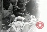 Image of medics aid wounded Marines at Tarawa Tarawa Gilbert Islands, 1943, second 1 stock footage video 65675023680