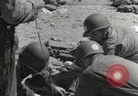 Image of medics aid wounded Marines at Tarawa Tarawa Gilbert Islands, 1943, second 8 stock footage video 65675023680