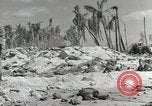 Image of medics aid wounded Marines at Tarawa Tarawa Gilbert Islands, 1943, second 23 stock footage video 65675023680