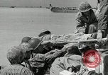Image of medics aid wounded Marines at Tarawa Tarawa Gilbert Islands, 1943, second 27 stock footage video 65675023680