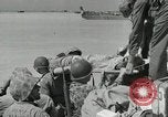 Image of medics aid wounded Marines at Tarawa Tarawa Gilbert Islands, 1943, second 29 stock footage video 65675023680