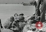 Image of medics aid wounded Marines at Tarawa Tarawa Gilbert Islands, 1943, second 30 stock footage video 65675023680