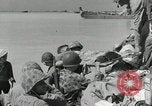 Image of medics aid wounded Marines at Tarawa Tarawa Gilbert Islands, 1943, second 31 stock footage video 65675023680