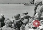 Image of medics aid wounded Marines at Tarawa Tarawa Gilbert Islands, 1943, second 33 stock footage video 65675023680