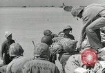 Image of medics aid wounded Marines at Tarawa Tarawa Gilbert Islands, 1943, second 34 stock footage video 65675023680