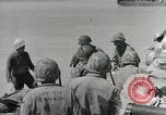 Image of medics aid wounded Marines at Tarawa Tarawa Gilbert Islands, 1943, second 36 stock footage video 65675023680