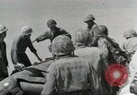 Image of medics aid wounded Marines at Tarawa Tarawa Gilbert Islands, 1943, second 38 stock footage video 65675023680