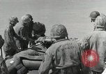 Image of medics aid wounded Marines at Tarawa Tarawa Gilbert Islands, 1943, second 41 stock footage video 65675023680