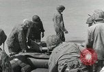 Image of medics aid wounded Marines at Tarawa Tarawa Gilbert Islands, 1943, second 45 stock footage video 65675023680