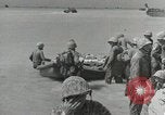 Image of medics aid wounded Marines at Tarawa Tarawa Gilbert Islands, 1943, second 53 stock footage video 65675023680