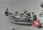 Image of medics aid wounded Marines at Tarawa Tarawa Gilbert Islands, 1943, second 58 stock footage video 65675023680