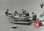 Image of medics aid wounded Marines at Tarawa Tarawa Gilbert Islands, 1943, second 59 stock footage video 65675023680