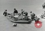 Image of medics aid wounded Marines at Tarawa Tarawa Gilbert Islands, 1943, second 60 stock footage video 65675023680