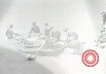 Image of medics aid wounded Marines at Tarawa Tarawa Gilbert Islands, 1943, second 61 stock footage video 65675023680