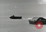 Image of wounded US soldiers at Tarawa Gilbert Islands, 1943, second 9 stock footage video 65675023681