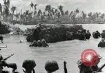 Image of wounded US soldiers at Tarawa Gilbert Islands, 1943, second 10 stock footage video 65675023681