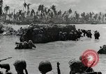 Image of wounded US soldiers at Tarawa Gilbert Islands, 1943, second 15 stock footage video 65675023681