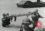 Image of wounded US soldiers at Tarawa Gilbert Islands, 1943, second 40 stock footage video 65675023681